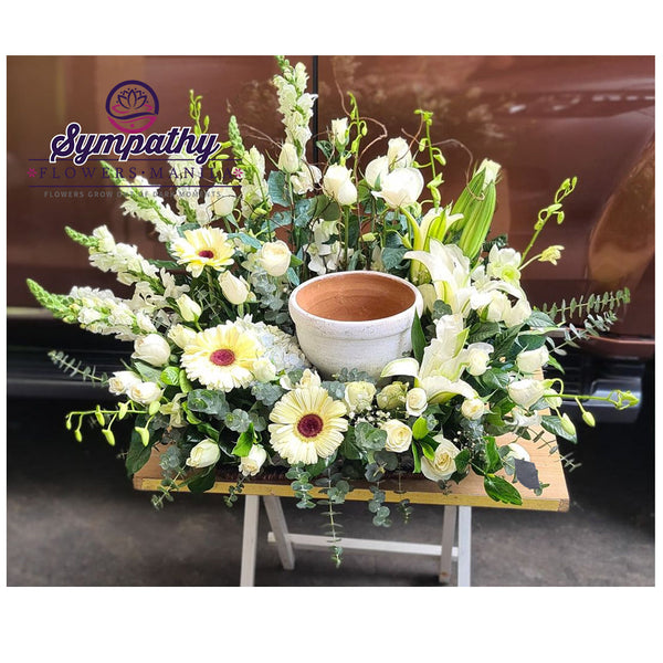 Peaceful White Urn Flowers